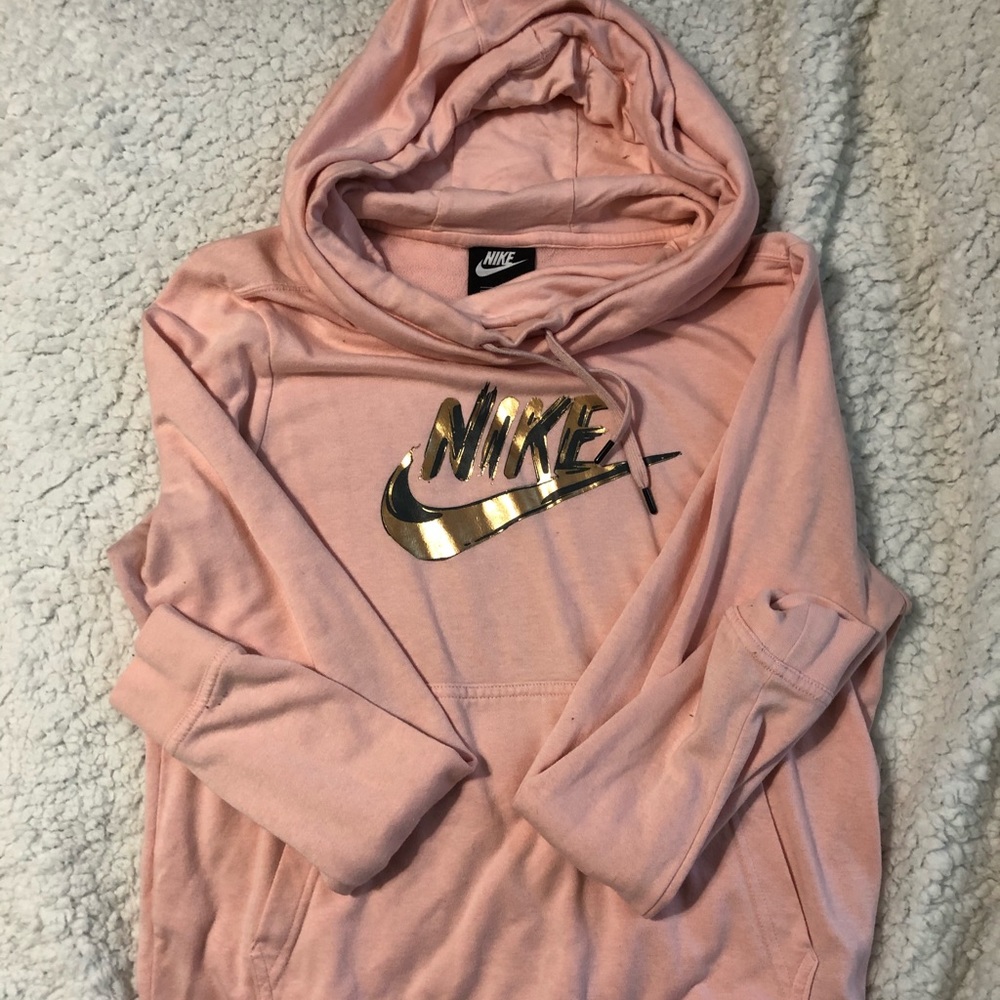 peach nike hoodie with metallic logo
